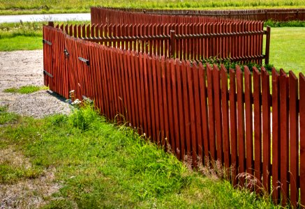 Red fence on Röe gård photo