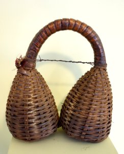 Rattle, probably Tanzania, woven bamboo, traces of red paint, red feathers - Fitchburg Art Museum - DSC08964