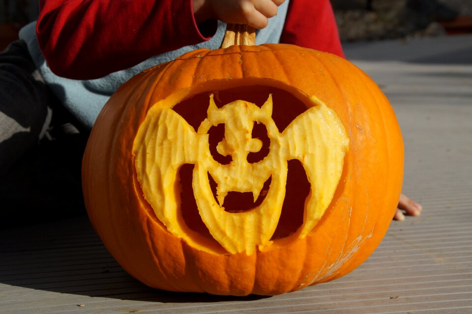 Pumpkin ghost carved art