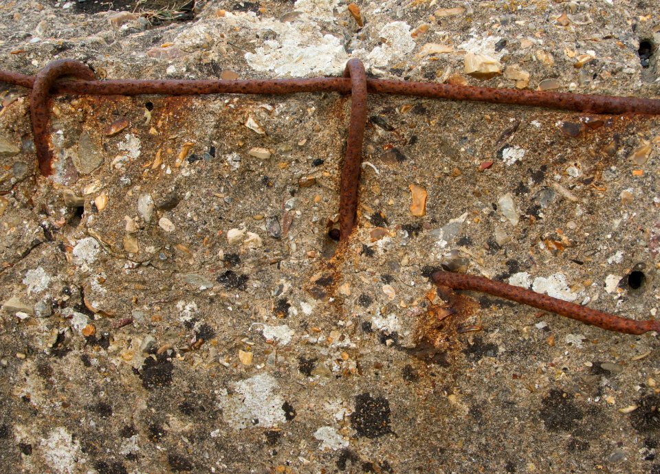 Reinforced concrete rusted rebars german bunkers Pointe du Hoc