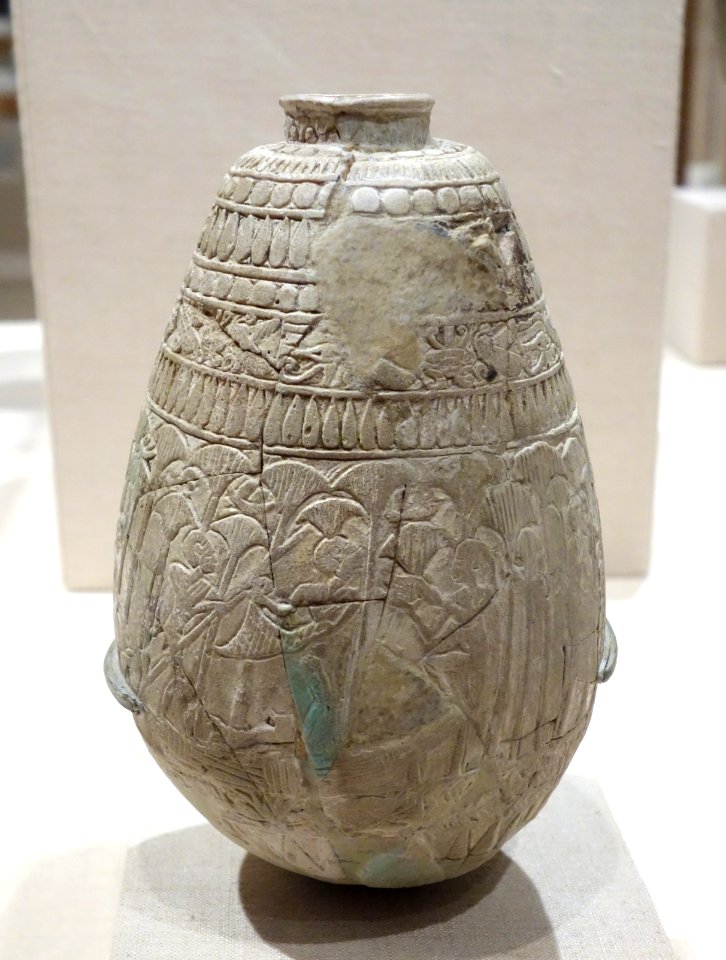Relief-decorated Ovoid Bottle - Egypt, reportedly from Deir el Nawahid near Abydos, Third Intermediate Period, perhaps Dynasty XXII, c. 945-718 BC, glazed faience - Brooklyn Museum - Brooklyn, NY - DSC08762