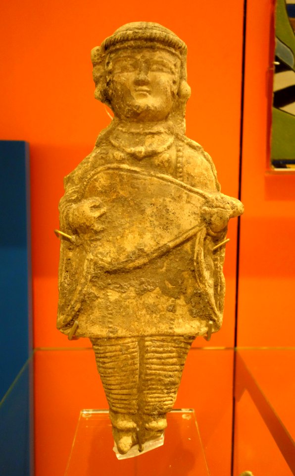 Relief or architectural ornament with an oudh player, Iran, 11th-12th century, slip-painted earthenware - Royal Ontario Museum - DSC04641