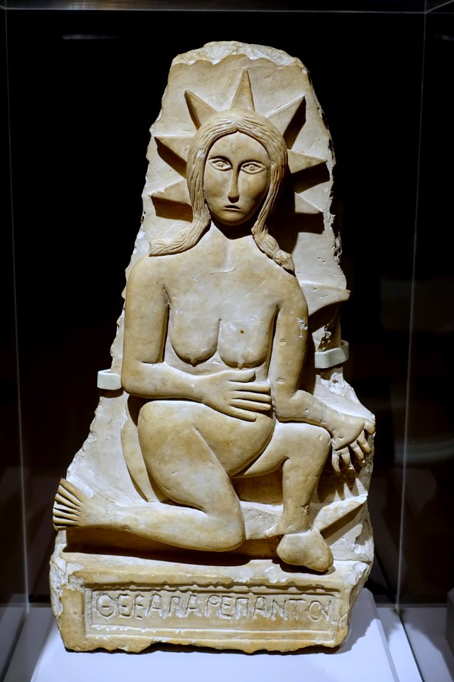 Relief of goddess, possibly Astarte, with Greek inscription 'divine producer of all', unknown origin and date, perhaps a forgery, limestone - Harvard Semitic Museum - Cambridge, MA - DSC06078
