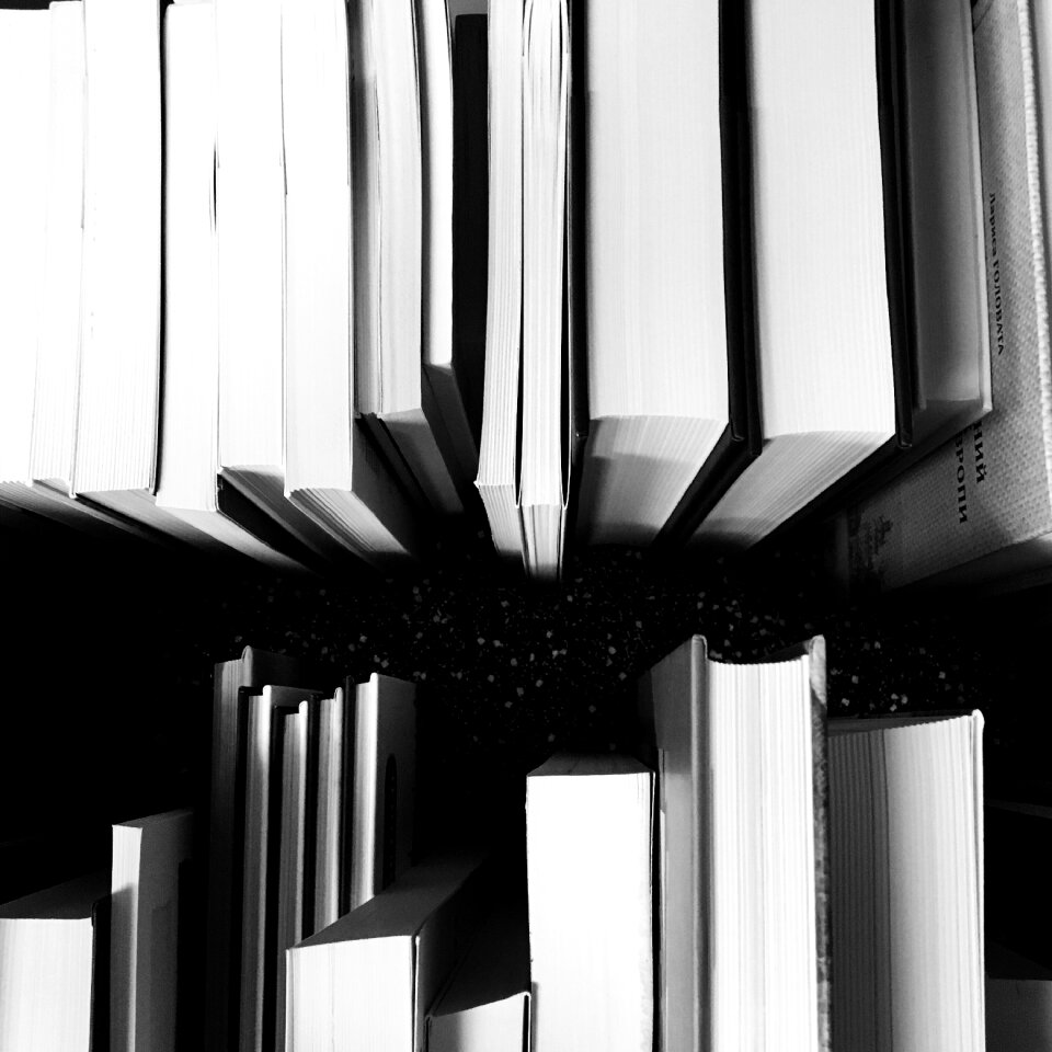 Library pile of books studying