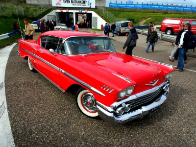 Red 1958 Chevrolet Impala pic2 photo