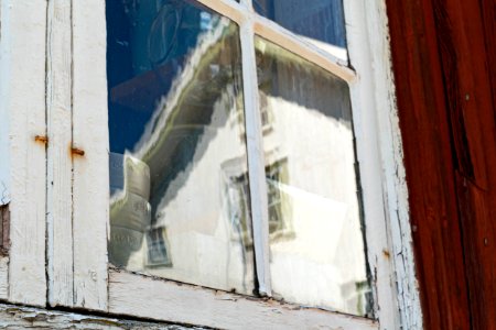 Reflection in a window with hand-blown glass 1