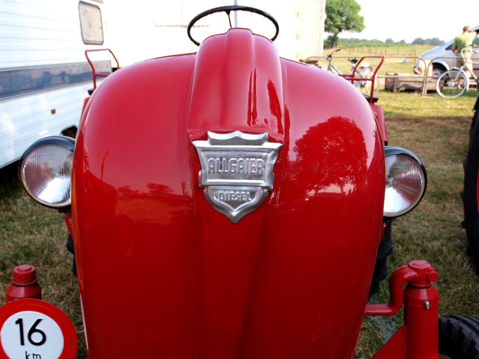 Red Porsche Algaier diesel logo