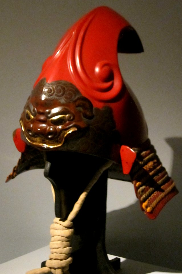 Red-lacquered eboshi-shaped helmet with demonic Chinese lion