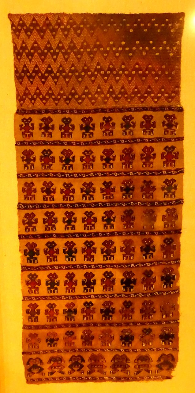 Rectangular tapestry panel with stylized humans, Peru, Central Coast Wari at Ancon, c. 1000-1470 AD, cotton, alpaca wool, view 1 - Krannert Art Museum, UIUC - DSC06471