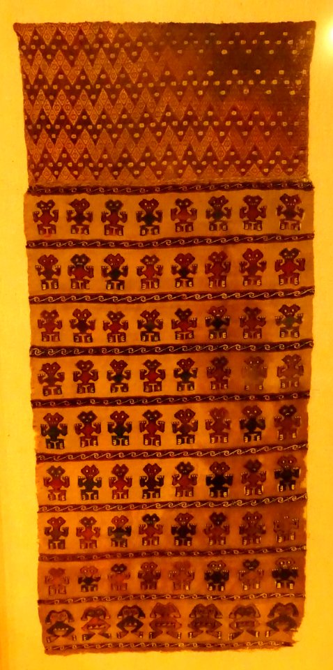 Rectangular tapestry panel with stylized humans, Peru, Central Coast Wari at Ancon, c. 1000-1470 AD, cotton, alpaca wool, view 1 - Krannert Art Museum, UIUC - DSC06471