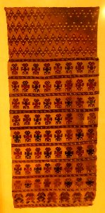 Rectangular tapestry panel with stylized humans, Peru, Central Coast Wari at Ancon, c. 1000-1470 AD, cotton, alpaca wool, view 1 - Krannert Art Museum, UIUC - DSC06471