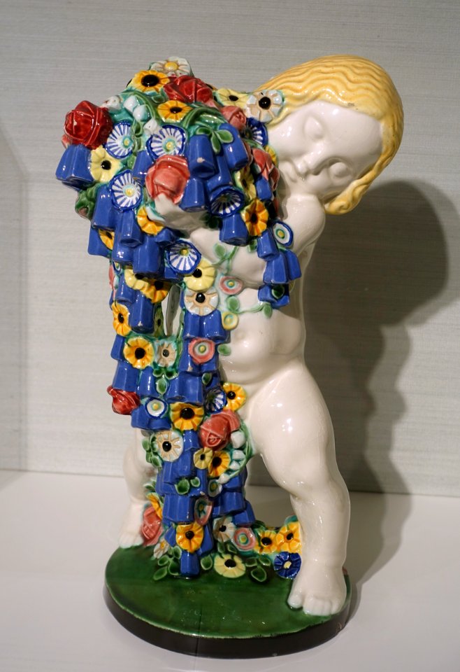 Putto 'Spring' by Michael Powolny, Wiener Keramik, c. 1907, majolica - Hessisches Landesmuseum Darmstadt - Darmstadt, Germany - DSC00858