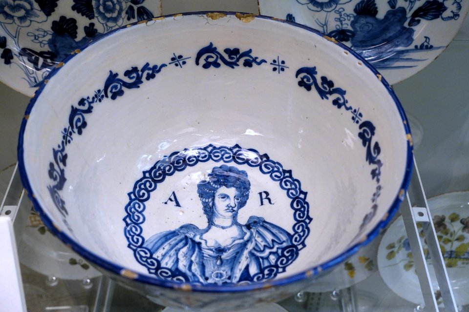 Punch bowl with Queen Anne and 'long Eliza' figures, view 1, Bristol, England, c. 1730, tin-glazed earthenware, HD 60.126 - Flynt Center of Early New England Life - Deerfield, Massachusetts - DSC04363