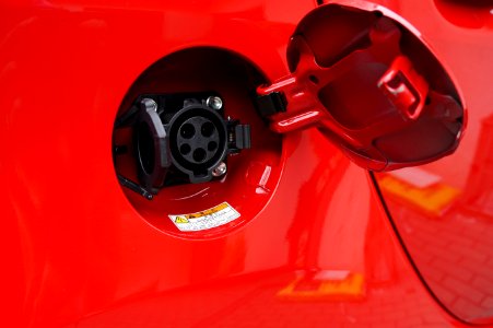 Public domain image - J1772 Level 2 charge socket on electric car