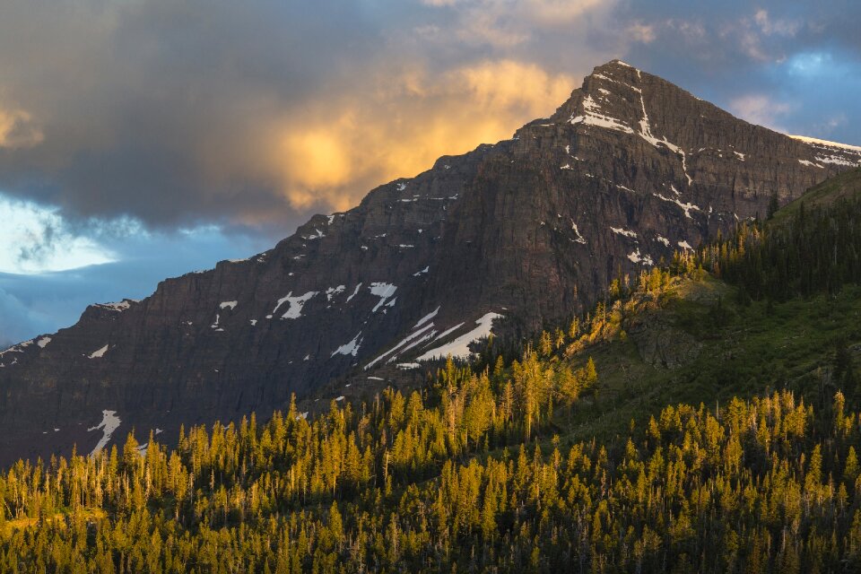 Sun clouds glacier national park