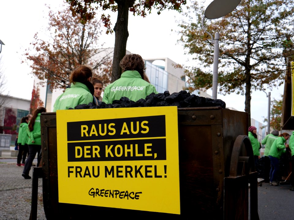 Protest of Greenpeace with coal in front of the German Chancellery 07