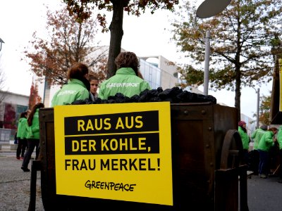 Protest of Greenpeace with coal in front of the German Chancellery 07