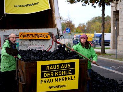 Protest of Greenpeace with coal in front of the German Chancellery 08