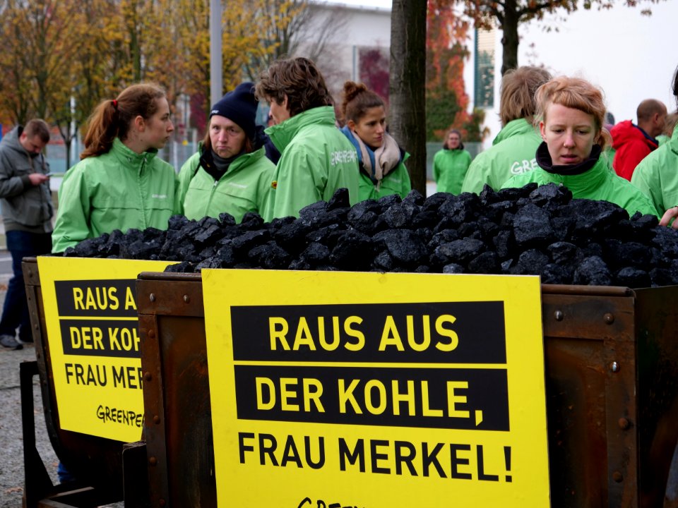 Protest of Greenpeace with coal in front of the German Chancellery 05