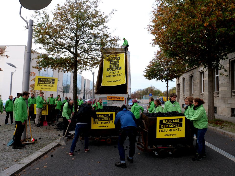 Protest of Greenpeace with coal in front of the German Chancellery 13