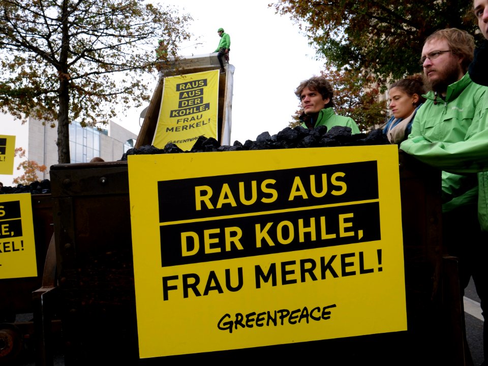 Protest of Greenpeace with coal in front of the German Chancellery 11