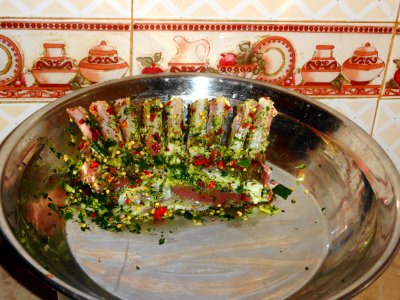 Rack of Lamb while marinated in Herbs and Spices photo