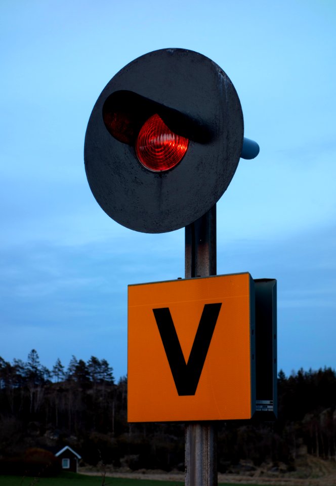 Railway signal at dusk