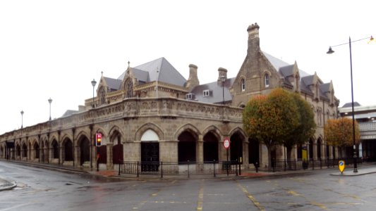 Railway Station With Shops, Offices And Two Bridges