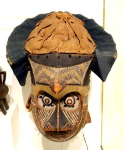 Pwoom Itok Mask, Bushoong or Ngeende people, Kuba, West Kasai province, Democratice Republic of the Congo, 19th century, wood, shell, raffia, pigment - Brooklyn Museum - Brooklyn, NY - DSC08542
