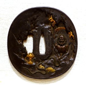 Rakan in Meditation, tsuba, Japan, Kitokusai Shomin, 1865 AD, iron, shibuichi (copper and silver alloy), gold - Peabody Essex Museum - DSC07446
