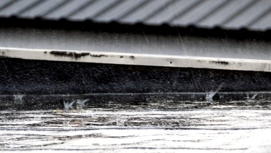 Rain splashes on rooftop 1