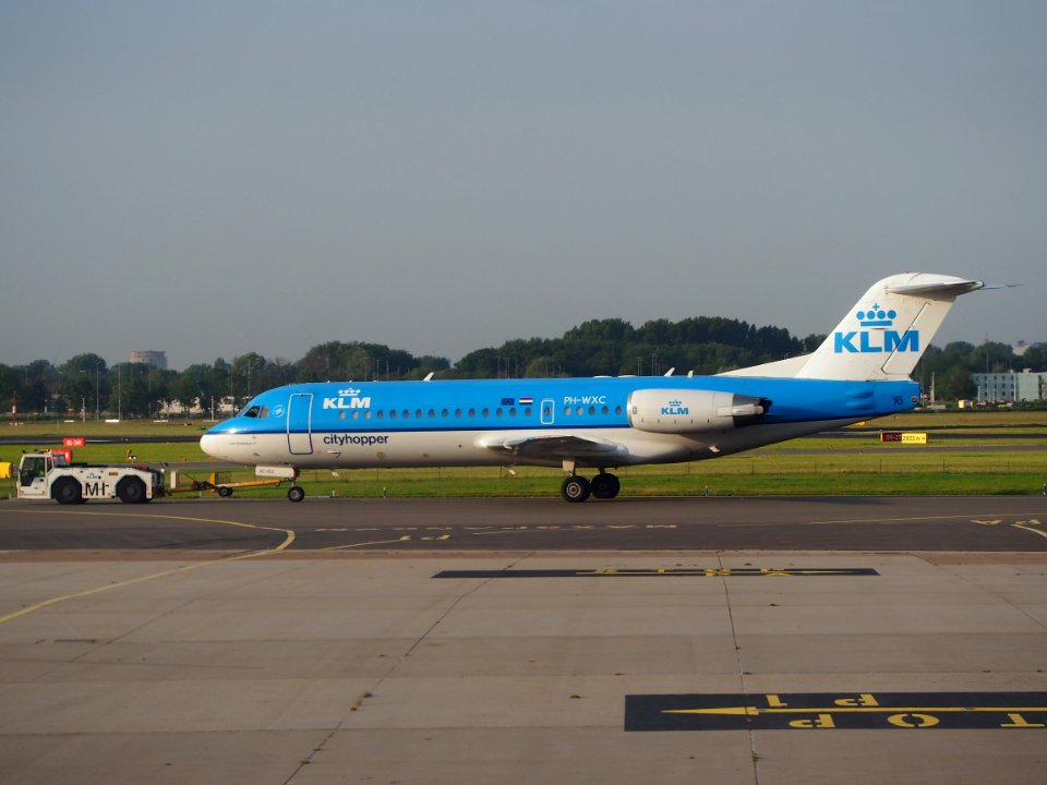 Pushback tractor and Fokker 70 PH-WXC