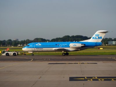 Pushback tractor and Fokker 70 PH-WXC