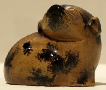 Puppy netsuke made by Hajimi Saku, 18th-19th century, carved and lacquered wood, Honolulu Museum of Art
