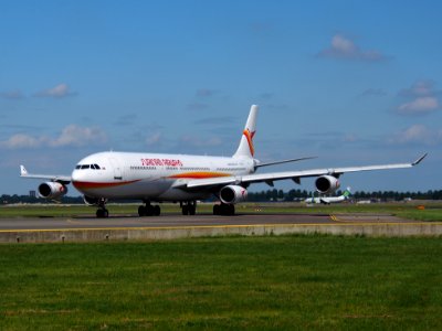 PZ-TCP Surinam Airways Airbus A340-311 taxiing at Schiphol (AMS - EHAM), The Netherlands, 18may2014, pic-4 photo