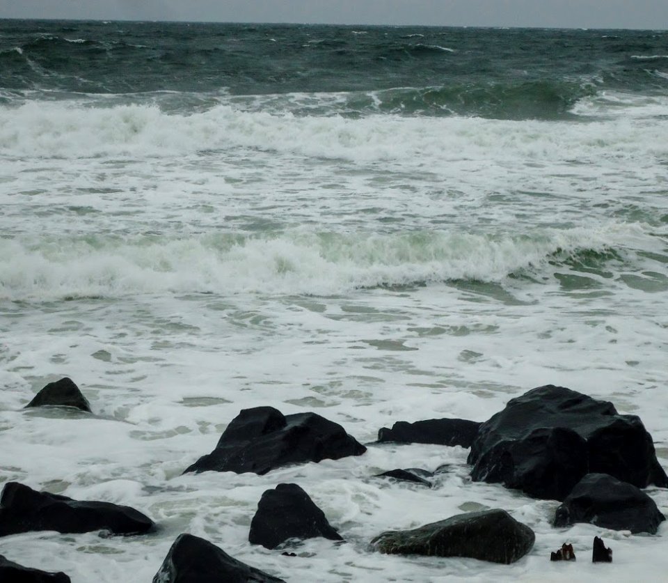 Rocks and waves windy day Jersey shore Atlantic Ocean