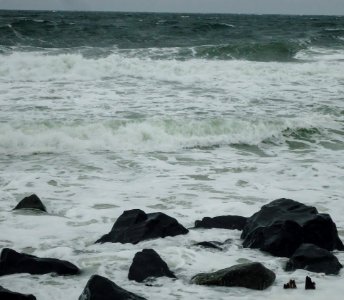 Rocks and waves windy day Jersey shore Atlantic Ocean