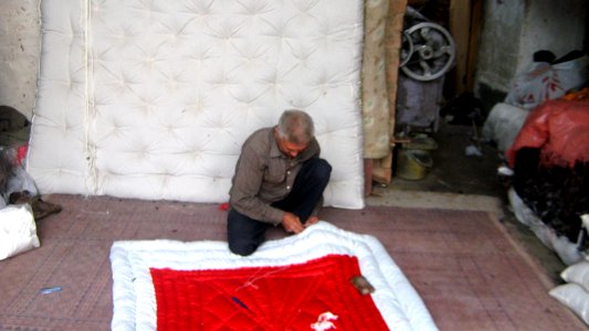 Quilter and quilting in the Bazaar of Nishapur 07