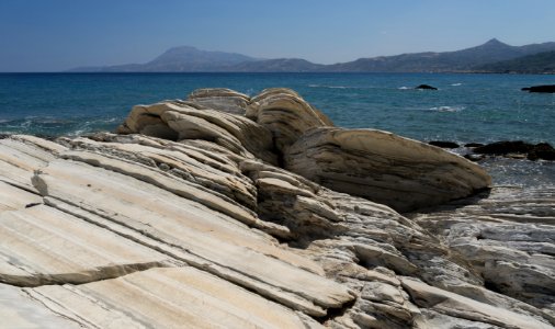 Rocks in the sea in Karystos Euboea Greece photo