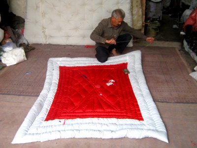 Quilter and quilting in the Bazaar of Nishapur 17