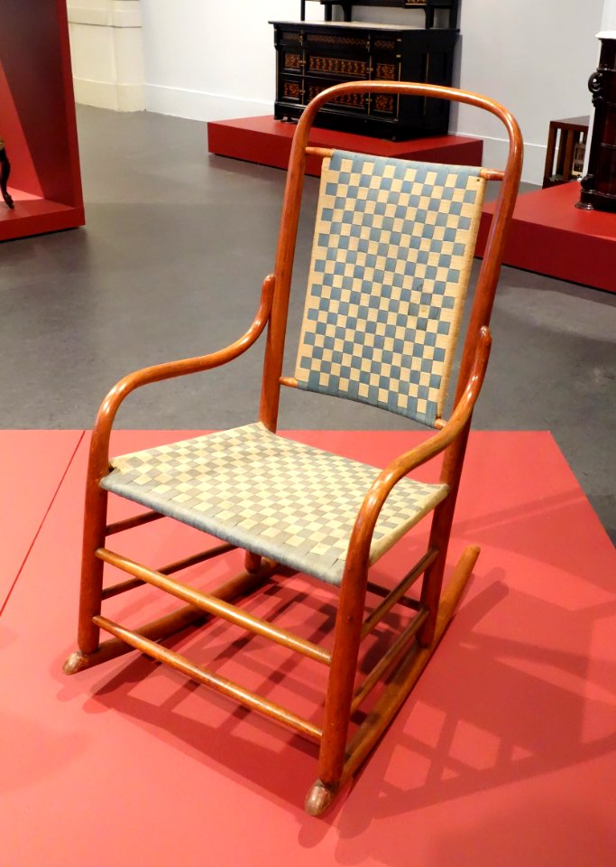 Rocking Chair by Grove M. Harwood and Robert Wood, patented February 23, 1875, made by Henry L. Seymour Chair Manufactory, Troy, New York, wood, original wool tape - Brooklyn Museum - Brooklyn, NY - DSC08801