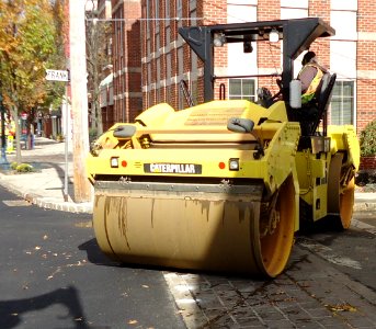 Road paving vehicle for smoothing in New Jersey 3