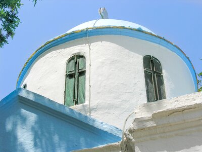 Little church cross blue sky