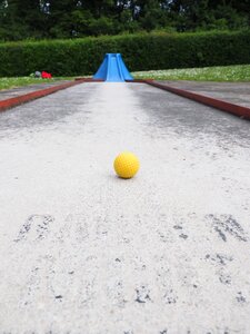 Checkered ball guide miniature golf photo