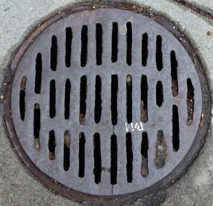 Round drain, poorly made - Cambridge, MA - DSC04702 photo