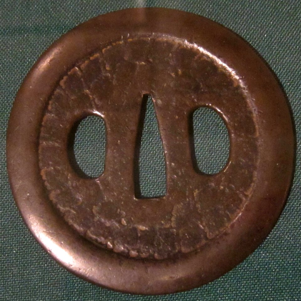 Round sword guard, 14th century, unrefined copper (yamagane)