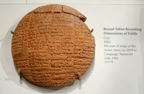Round tablet in Sumerian language recording dimensions of fields, Tello, 8th year of reign of Amar-Suen, c. 2039 BC, clay - Oriental Institute Museum, University of Chicago - DSC07081