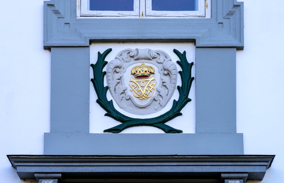 Royal monogram Frederik 4 castle Odense Denmark
