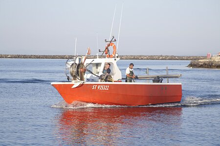 Fisherman net fishing boats photo