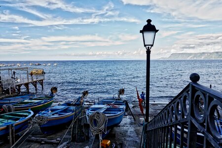 Clouds beach boat photo